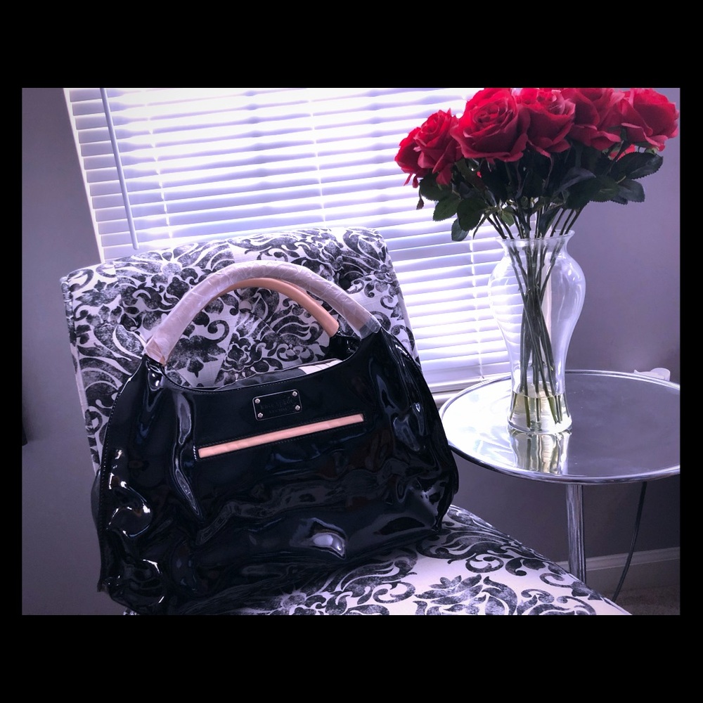 Authentic Kate Spade handbag. New with tags